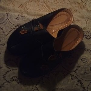 Black clogs with flowers